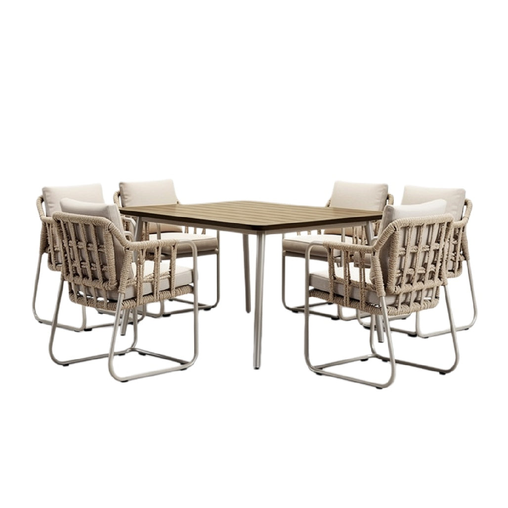 Moderne buitentafel met zes geweven stoelen